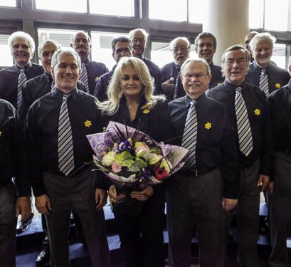 Photo of choir at Swansea University with
                  Bonnie Tyler
